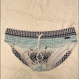 2(X)ist swim brief, white with blue polka dots.